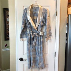 Burberry woman’s plaid robe, with front pockets.